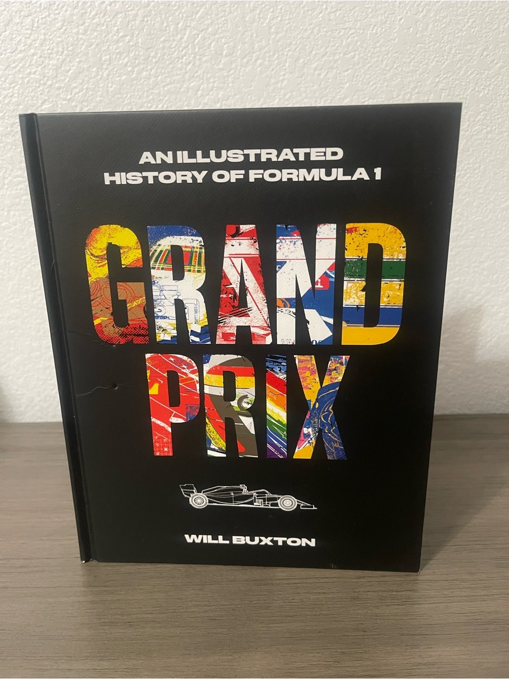 Grand Prix: An Illustrated History of Formula 1 - Black Multicolor Cover